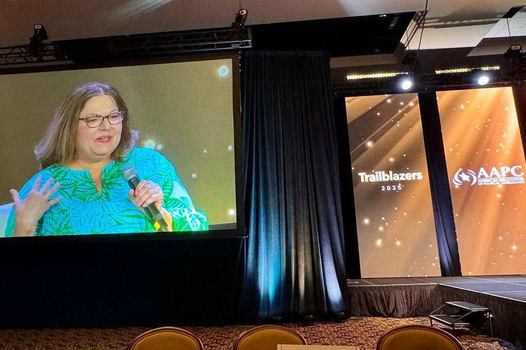 Nancy Bocksor speaking onstage