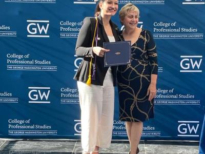 Toni Marsh with student receiving the certificate