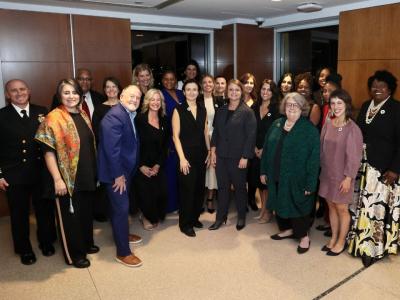Group of ECLC cohort 4 graduates posing with Dean Riddle