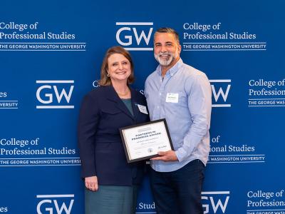 Martin V. receiving award from CPS Dean Riddle