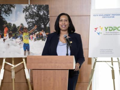 Mayor Muriel Bowser speaks at a podium