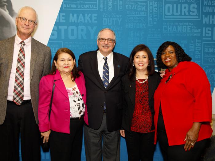 4 CPS employees with 20 or more years of service with the GW president