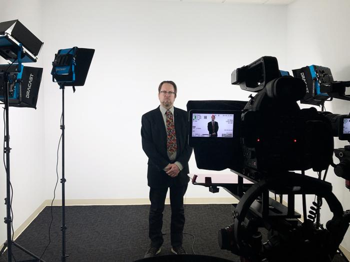 John Warren, publishing program director, filming in new studio