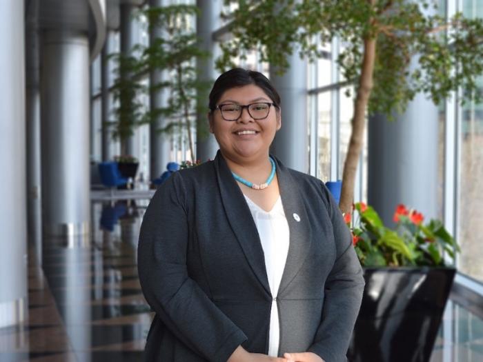 Angel Benally, a spring 2020 alumna of the NAPLP in professional attire.