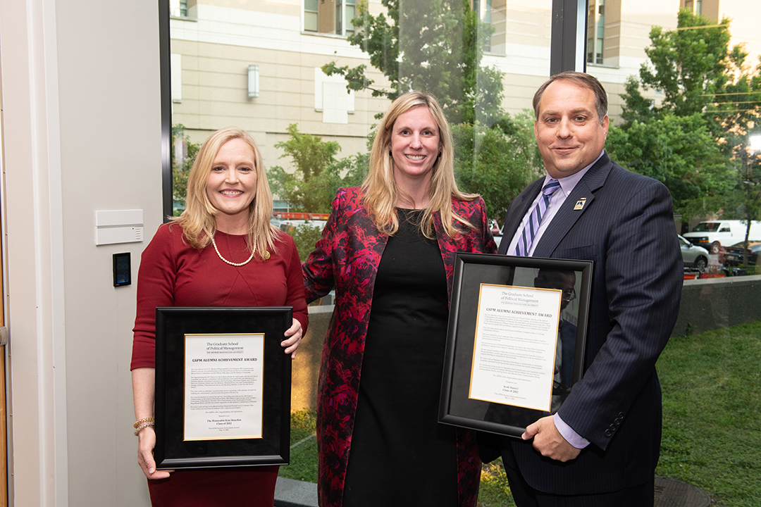 2 Alumni Award winners with presenter