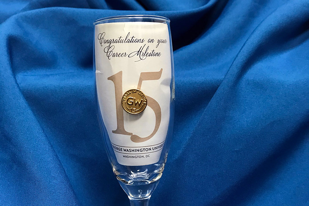 15 year service anniversary pin in cup