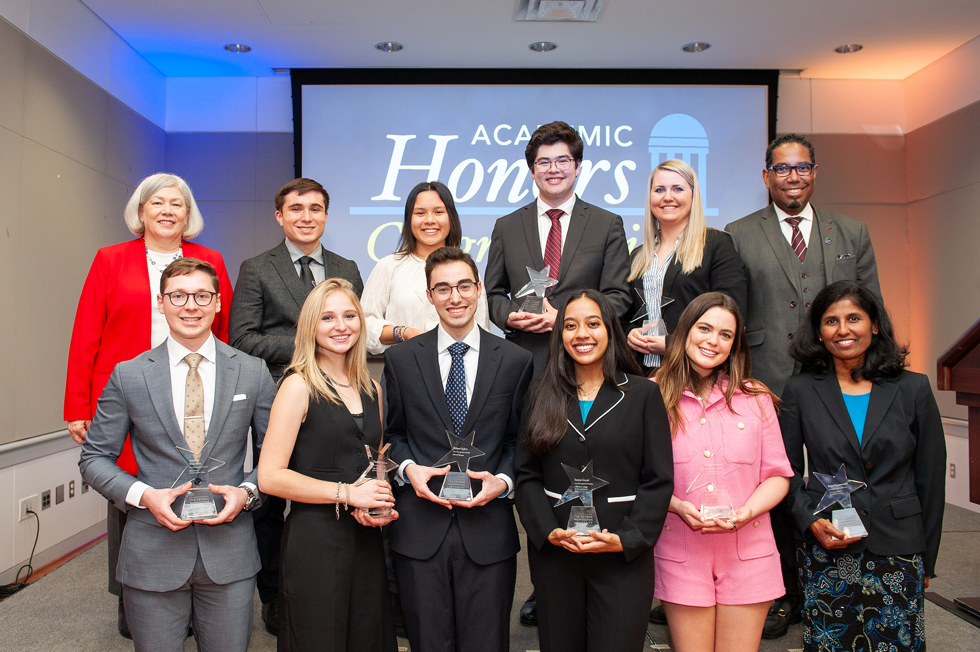 Chris Linares with group of recognized students and GW administration