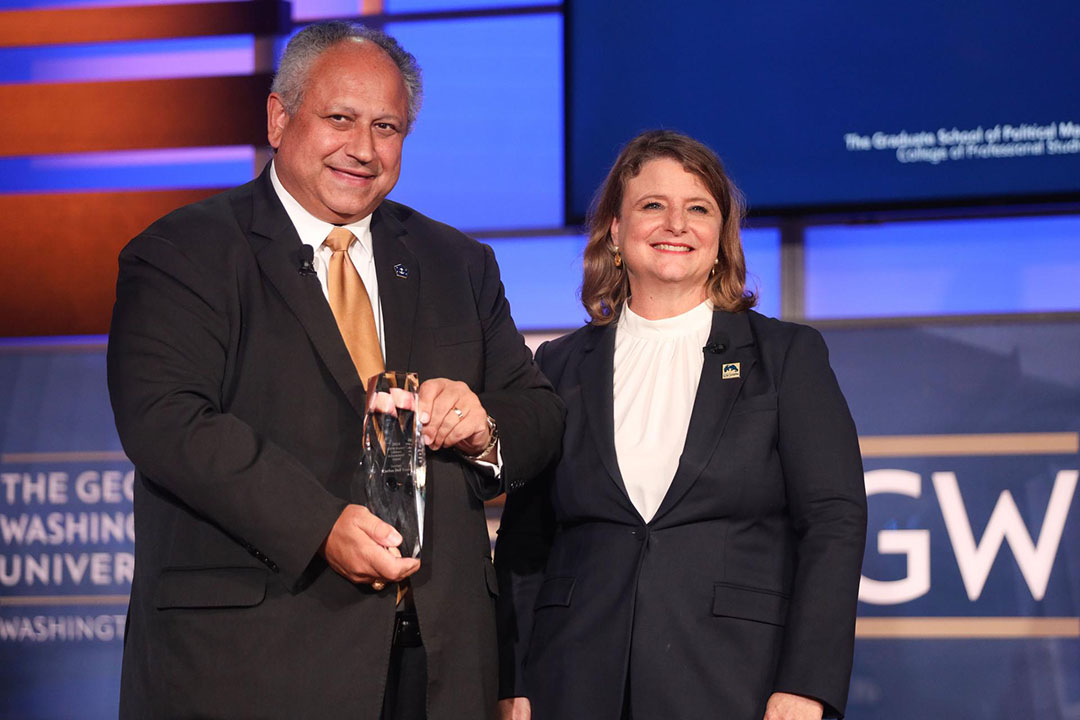Secretary Del Toro and Dean Liesl Riddle