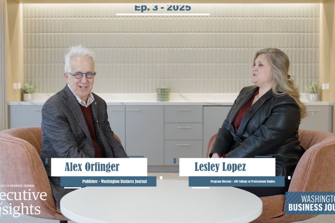 Alex Orfinger and Lesley Lopez sitting in chairs opposite one another