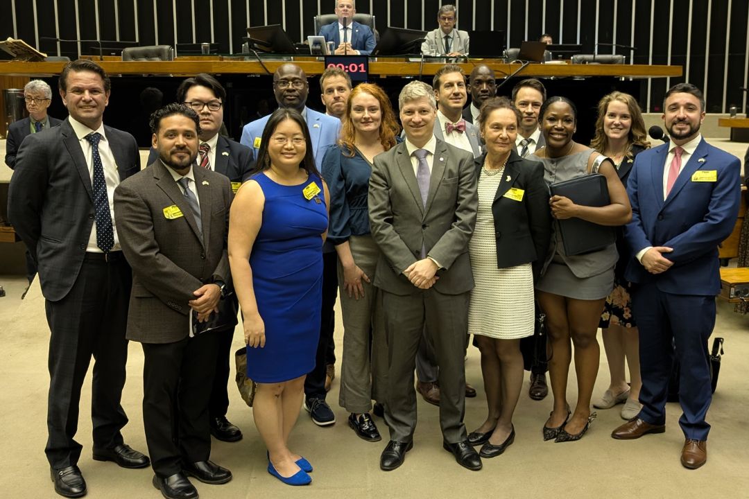 GSPM and CPS students pose on the floor of the Chamber of Deputies with Deputy Marcel van Hattem.
