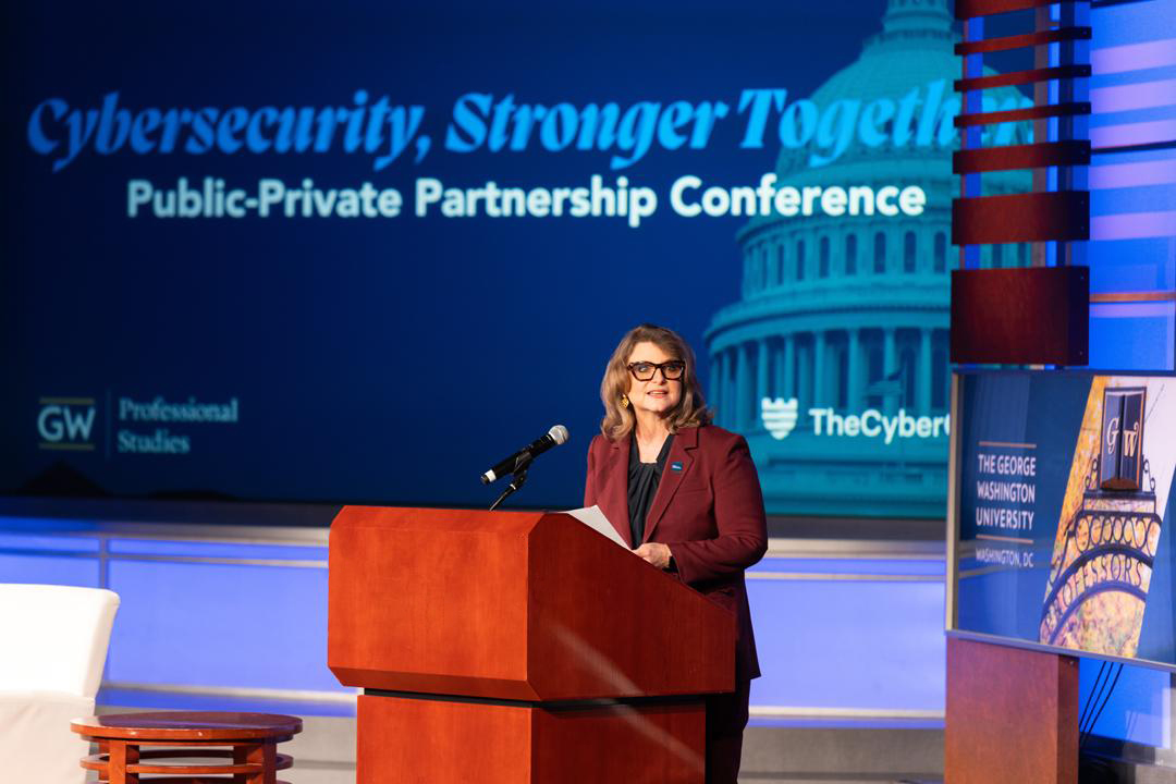 Liesl Riddle speaking at the Cyber conference in JMA Auditorium