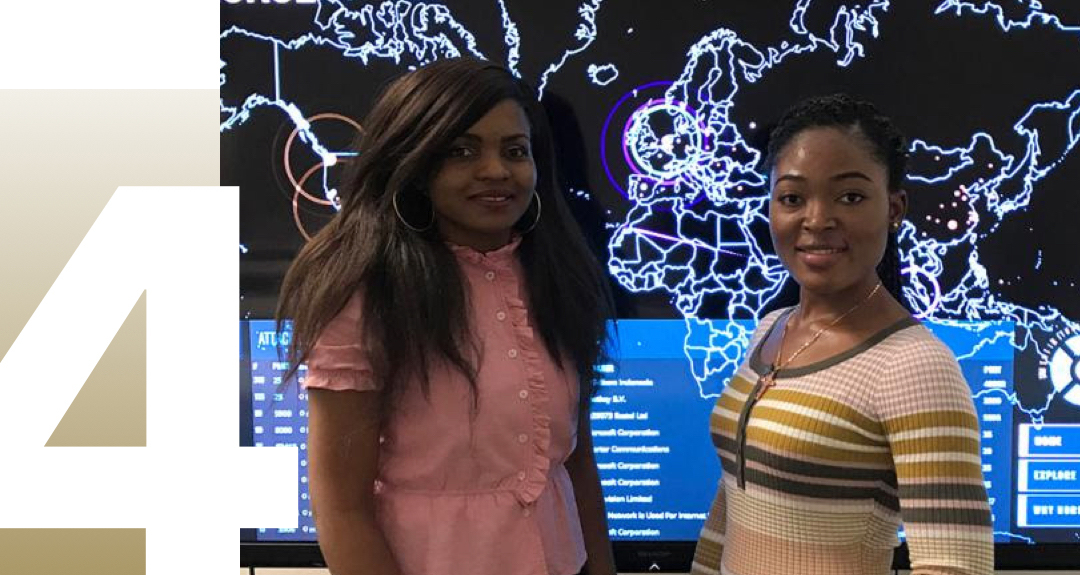 4 Bachelor's Programs, 2 women in front of world map with active hacks on it and the number 3