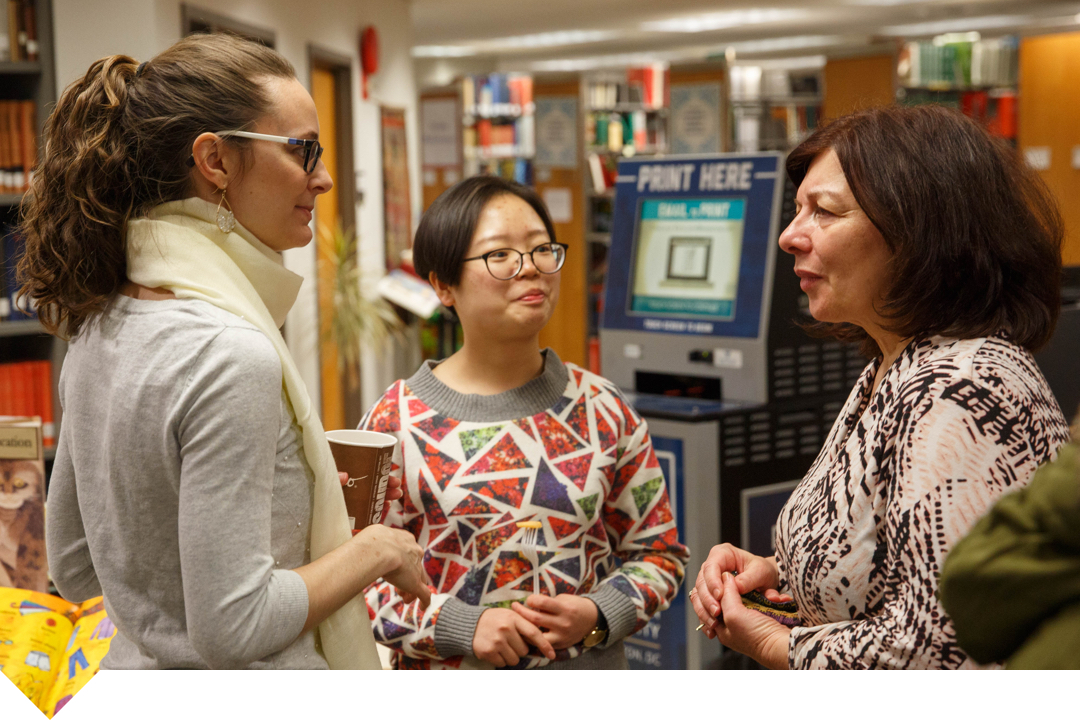 Group of three women talking