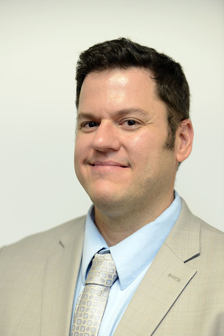 Eric Martin headshot in suit