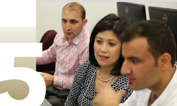 5; students looking at computers