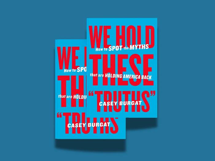 Two copies of "We Hold These "Truths": How to Spot the Myths that are Holding America Back" by Casey Burgat on a blue background