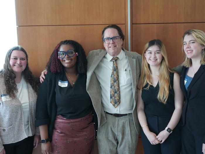 Jessica Irving, Maiya Norwood, John Warren, Breanna Crossman, and Amelia Nason standing together and smiling