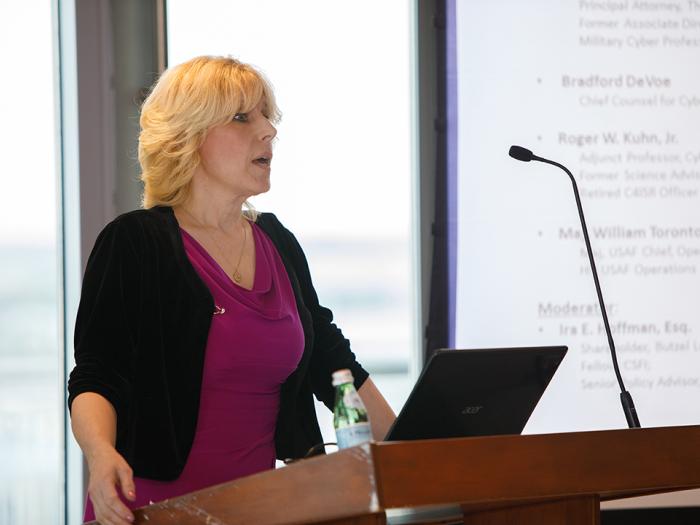 Connie Uthoff speaks at podium