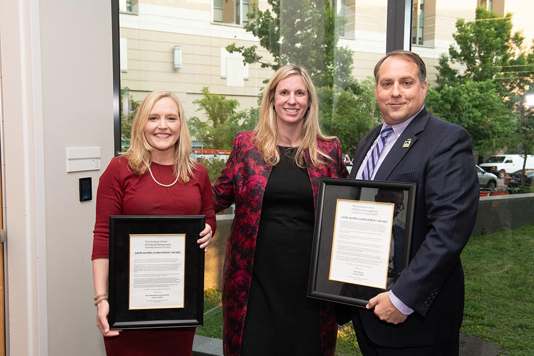 2 Alumni Award winners with presenter