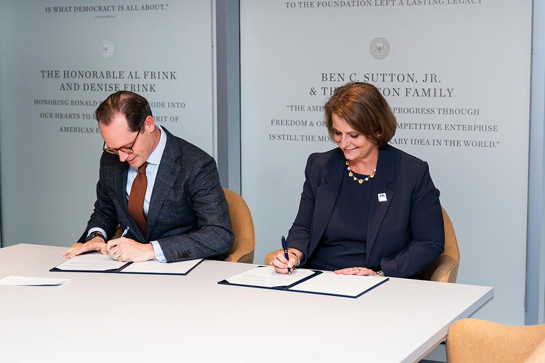 Roger Zakheim, director of the Ronald Reagan Institute with Liesl Riddle, dean of CPS.