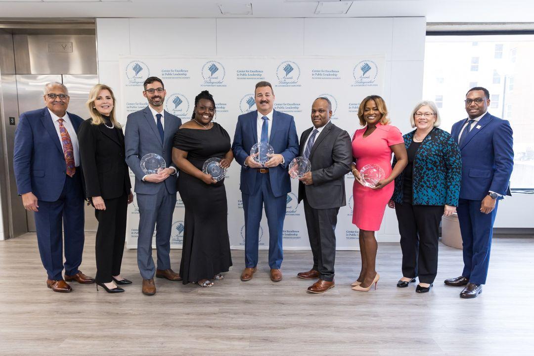 All individual winners with James Robinson, Jane L. Cafritz, President Ellen Granberg and Director Charles Hall Jr. in front of a step-and-repeat