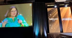 Nancy Bocksor speaking onstage